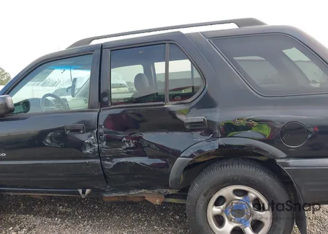 2004 Isuzu Rodeo S/S 3.2L V6 z USA, uszkodzony, nr VIN 4S2CK58W644310167